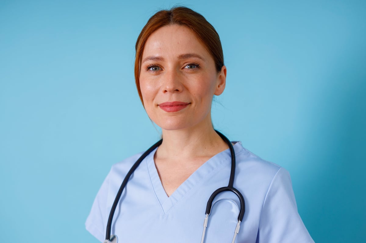 Healthcare professional female doctor wearing scrubs